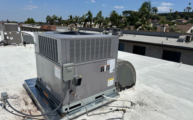 Newly installed rooftop package unit on a commercial building
