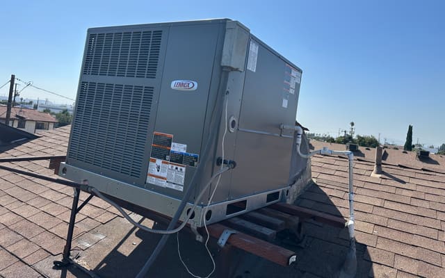 Lennox rooftop package unit on a residential roof